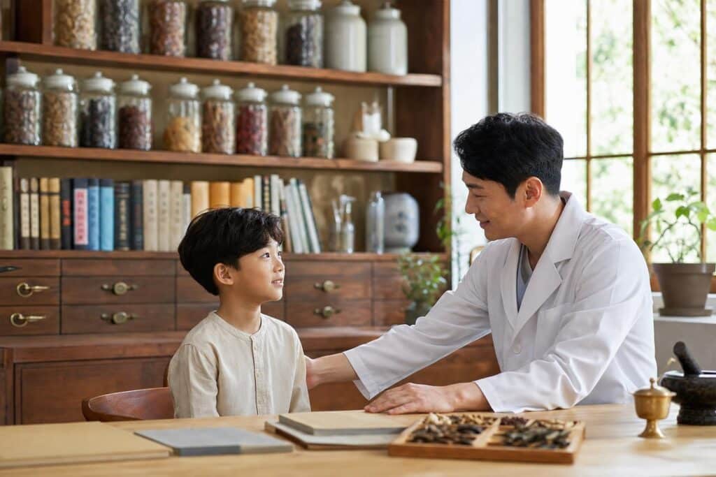 한의원에서 자폐 치료를 위해 상담 중인 아동과 한의사